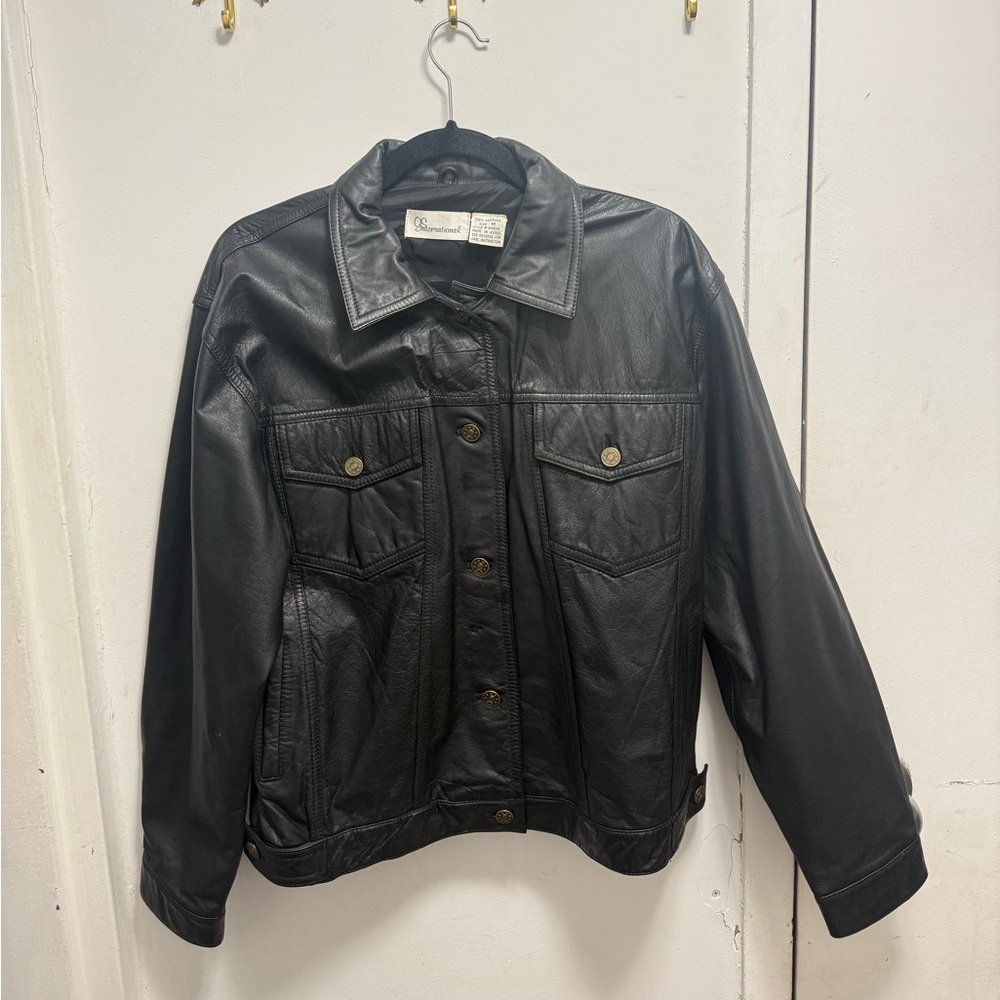 Oversized black leather jacket
